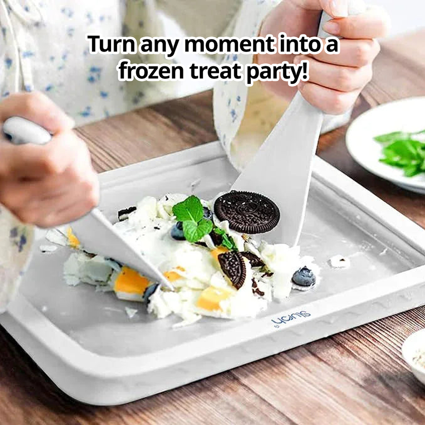 Person using slursh ice cream maker tray to create ice cream treats on a wooden table.