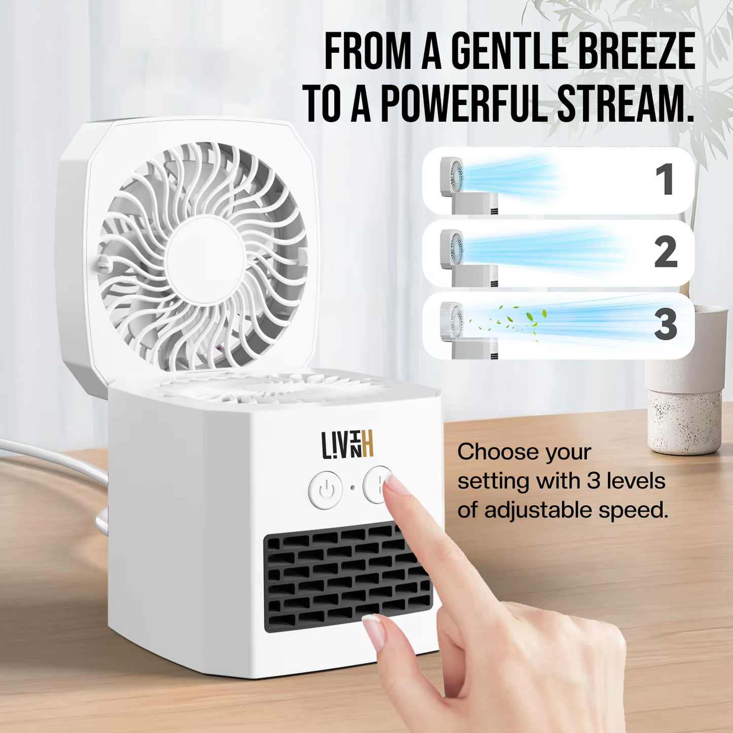 LivinH Air Switch Pro Portable 2 in 1 Heater and Fan with adjustable speed settings on a wooden surface