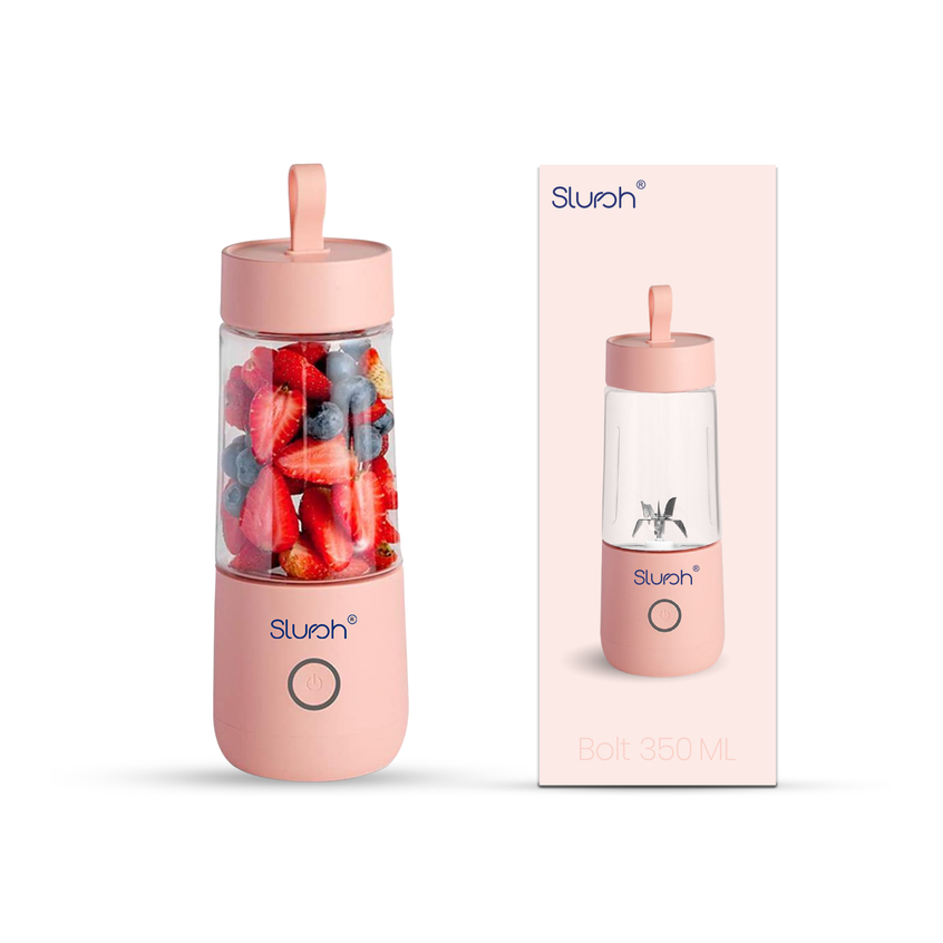 Pink Slursh Bolt 350 ML portable blender with fruit inside next to its packaging on a white background